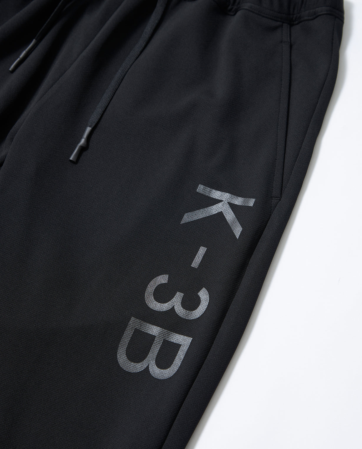 Black x Black ■ 115_G Recycled Yarn Mesh Graphic Jogger Pants